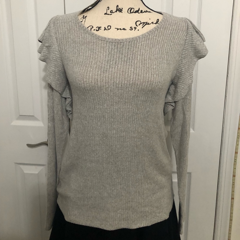 Grey sweater with ruffle shoulder detail